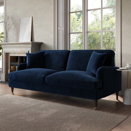 Navy velvet 3-seater sofa.