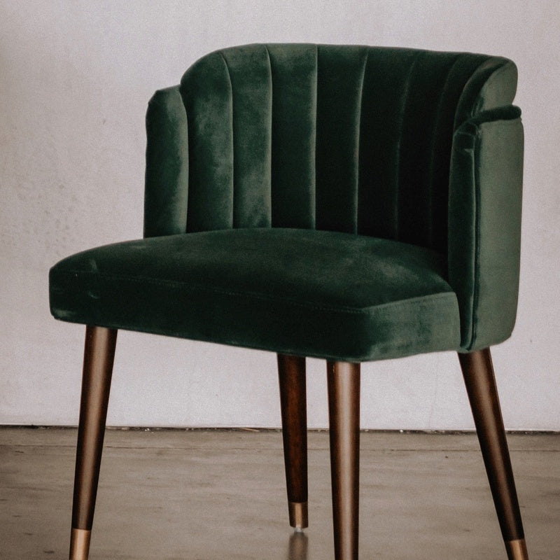 Forest green accent chair.